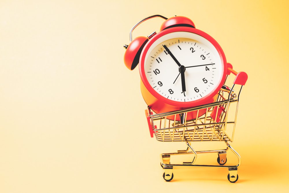 Alarm clock in shopping cart.