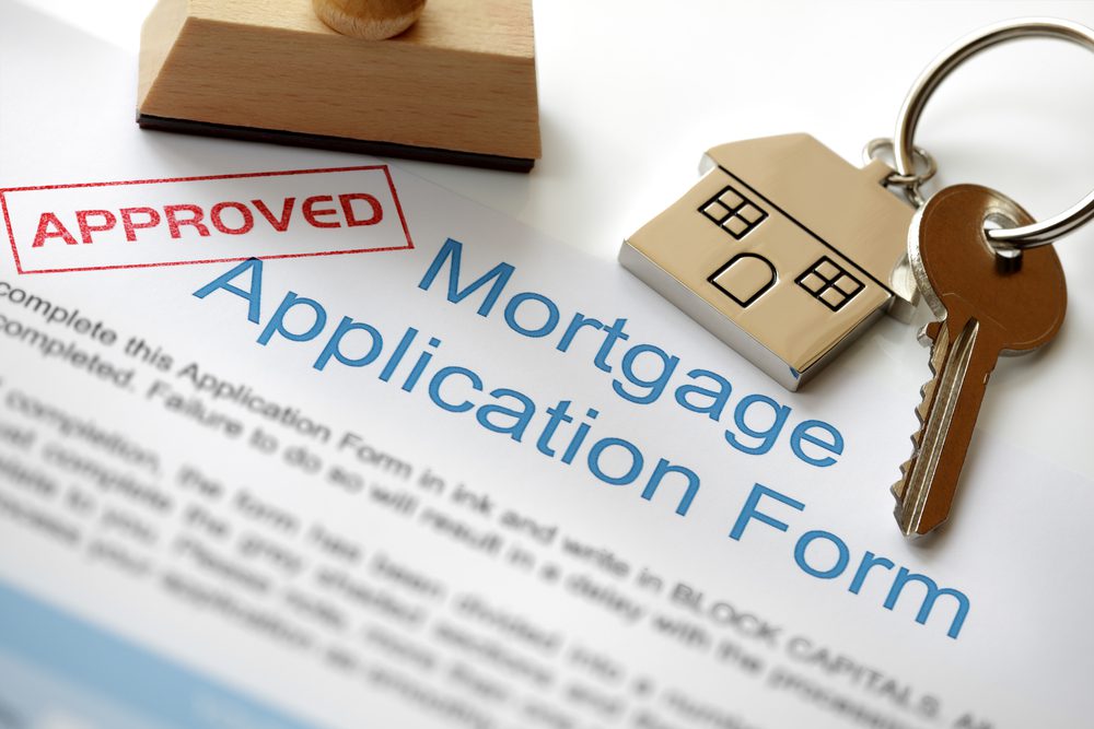 Mortgage application form and keys.