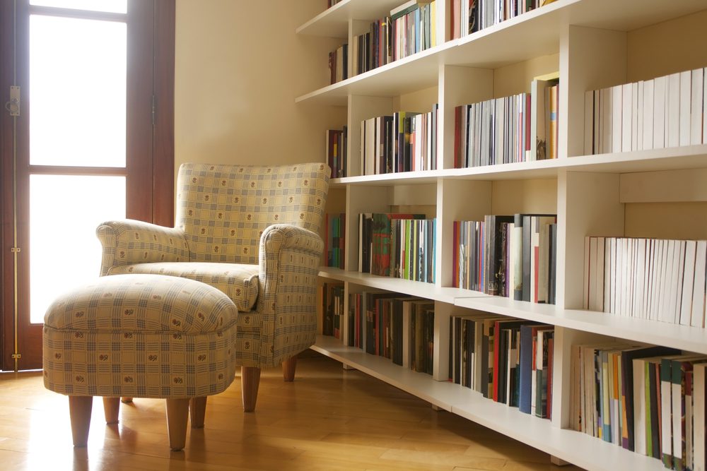 Home library with armchair.
